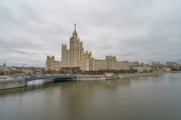 Moscow city image at the cloudy autumn  day. The Stalin era house is very massive building