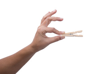 Hand holding Wooden Clothes Peg 