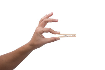 Hand holding Wooden Clothes Peg 