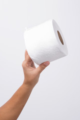 Hand Holding Toilet Paper 