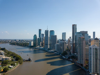 The syline of brisbane as shot from the brisbane river using a drone - obrazy, fototapety, plakaty