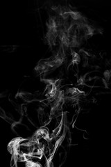 abstract white smoke in the air on a black background