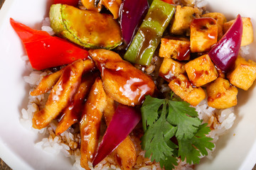 Wok with rice, cheese and tofu