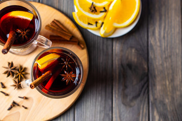 Flat lay mulled wine with spices and oranges