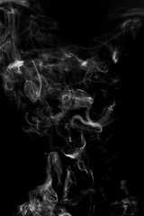 abstract white smoke in the air on a black background