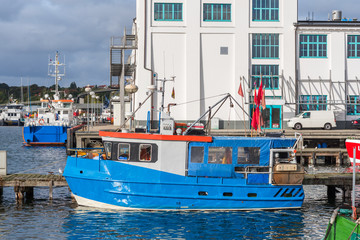 Fototapeta na wymiar Fishing vessel moored in the old fishing port of the seaside resort Sassnitz