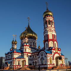 The domes of the Christian Cathedral glitter in the rays of the setting autumn sun.