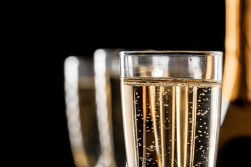 glasses of champagne with the bottle