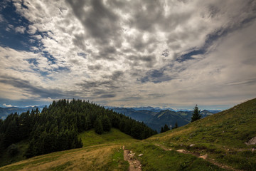 Mountain landscape with hiking trail and view of beautiful landscape. Salzkammergut region, Schafberg, Austria.
