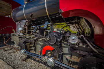 Red steam historic locomotive waiting in Schafbergspitze station near Salzburg, Upper Austria