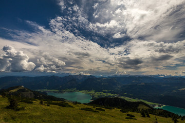 Mountain landscape on the top of the hiking trail to the Schafberg and view of beautiful landscape over the Wolfgang see lake. Salzkammergut region near Salzburg, Schafberg, Austria.