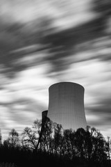 power plant cooling towers steam on background of blue sky