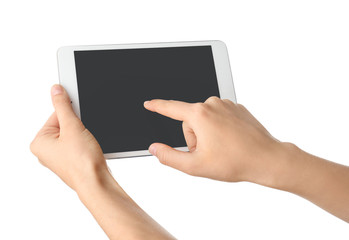 Young woman using tablet PC on white background