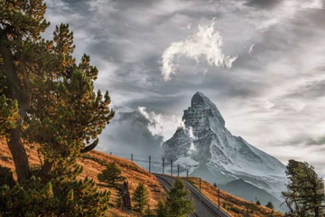 Rideaux velours Cervin Matterhorn peak with railway against sunset in Swiss Alps, Switzerland