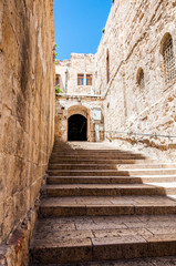Fototapeta premium Stone steps on ancient city street