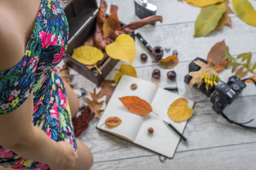 Autumn composition with objects and beautiful and sexy woman