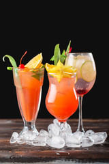 Multicolored cocktails at the bar close up shot