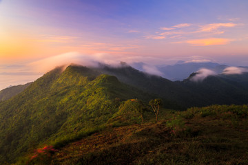 Fototapeta na wymiar Landscape of sunrise on Mountain View of Phu Chi Fa , Thailand