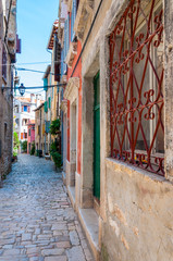 Cozy Old Town paving stone street in Rovinj Istria Croatia