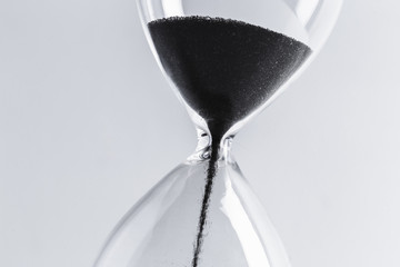 Close up hourglass on table