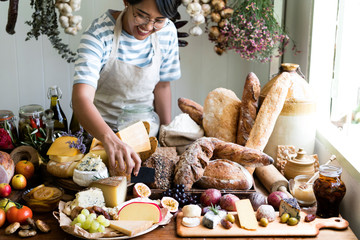 Woman selling cheese and bread