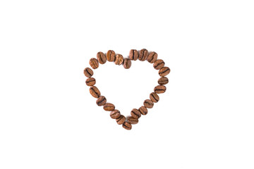 Outline heart made of coffee beans top view. Love coffee background isolated.