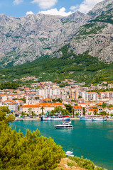Fototapeta na wymiar The bay of Makarska, Dalmatia, Croatia. Biokovo Mountain Range