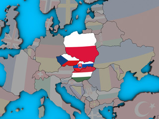 Visegrad Group with embedded national flags on blue political 3D globe.