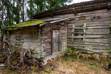 Abandoned boarded up door entrance to rural wooden house