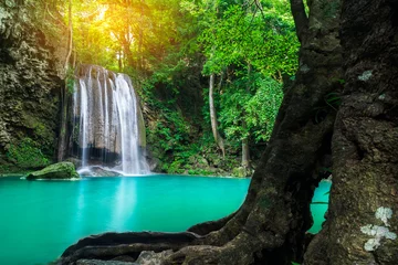 Zelfklevend Fotobehang Erawan waterfall at tropical forest of national park, Thailand  © totojang1977