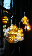 Set edison retro lamp on loft gray concrete background.