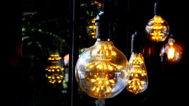 Set edison retro lamp on loft gray concrete background.
