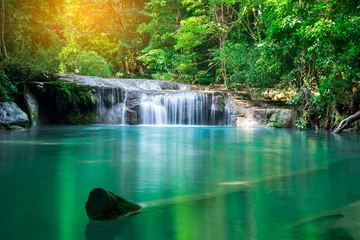 Deurstickers Erawan waterfall at tropical forest of national park, Thailand  © totojang1977