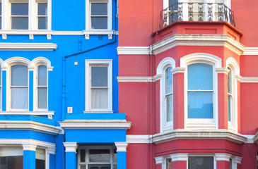colorful old classic buildings, facade and windows in Nothing Hill in London, UK                   