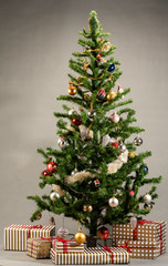 Christmas tree with presents underneath. High resolution image for Christmas Holliday.