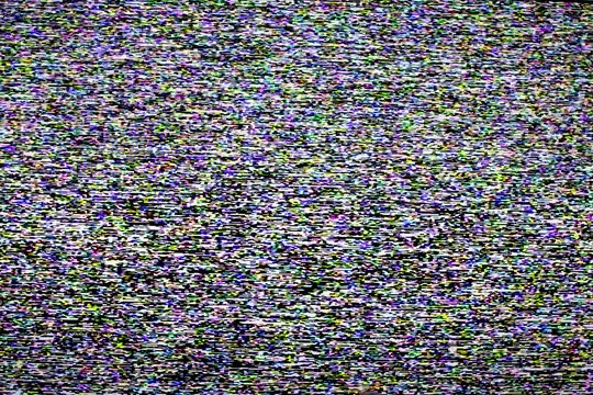 Glitch tv screen on digital television. Noise and glitch during radio transmission, image distorsion of a bad signal