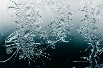 Snow patterns on glass as an abstract background