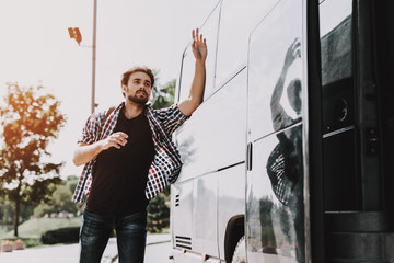 Young Handsome Tourist almost Late for Bus