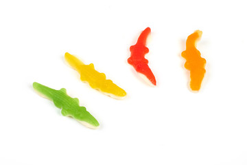 jelly candies in the crocodile shape isolated on white background.
