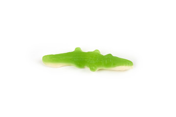 jelly candies in the crocodile shape isolated on white background.