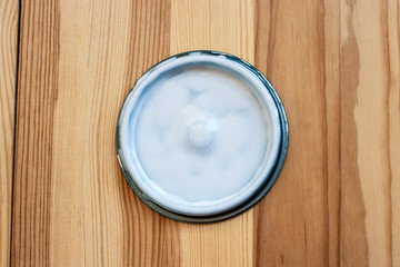  wooden board and lid from white paint background 