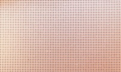 Beige metallic perforated leather texture. Leather texture with small black holes, abstract...