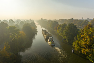 Barge on canal in Wrocław aerial view - obrazy, fototapety, plakaty