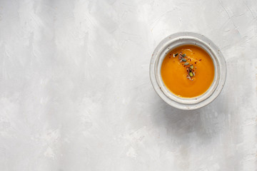 Minimal picture - pumpkin soup plate top view