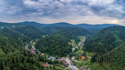 Fototapeta na wymiar Międzygórze with panorama of Sudety mountains aerial view
