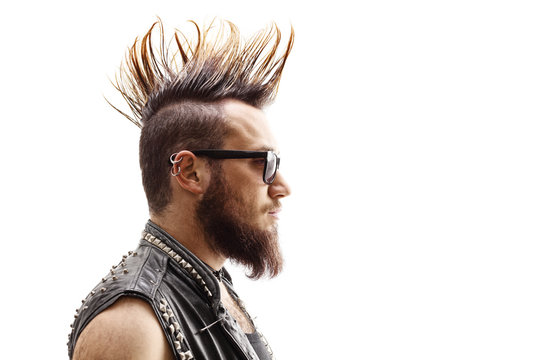Profile face shot of a male punker with mohawk hairstyle
