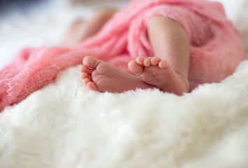 baby feet and pink wrap detail with space to write