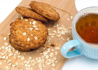Oatmeal cookies cup of coffee.