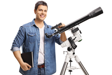 Smiling young man with a telescope