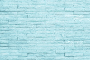 Seamless Blue pattern of decorative brick sandstone wall surface with concrete of modern style design decorative uneven have cracked realmasonry wall of multicolored stones or blocks with cement.